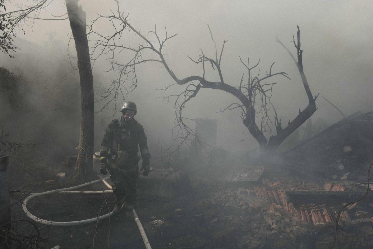 A rescue worker walks through the wreckage of a home after twin Russian bombings Sep. 1 in Kharkiv, Ukraine. Opinion Columnist Santiago Montañez Bertoletti believes supporting Ukraine in the Russia-Ukraine war is crucial to peace in Europe. (AP Photo/George Ivanchenko)