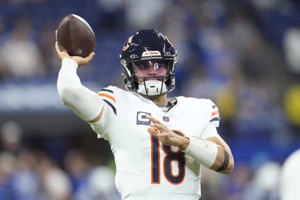 Chicago Bears quarterback Caleb Williams gets ready to throw a football before a game against the Indianapolis Colts on Sunday in Indianapolis, Indiana. Sports Reporter James Bennett believes that Williams still has potential to be successful in the NFL after a slow start in 2024. (Michael Conroy | AP Photo)