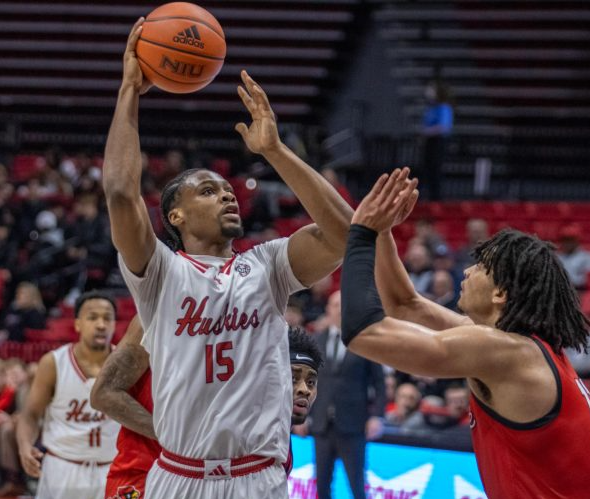 Then-sophomore forward Ethan Butler (15) shoots a floater over then-junior forward Basheer Jihad (11). NIU basketball released its non-conference schedule for the 2024-25 season. (Northern Star File Photo)