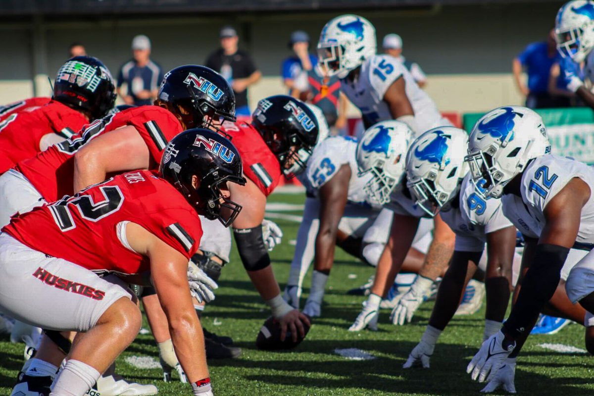 The NIU offensive line and Buffalo defensive line get set before the snap on the Huskies drive. The Huskies dropped to a record of 2 wins and 1 loss and Buffalo improved to 3 wins and 1 loss on the season. (Marco Alvarez | Northern Star)