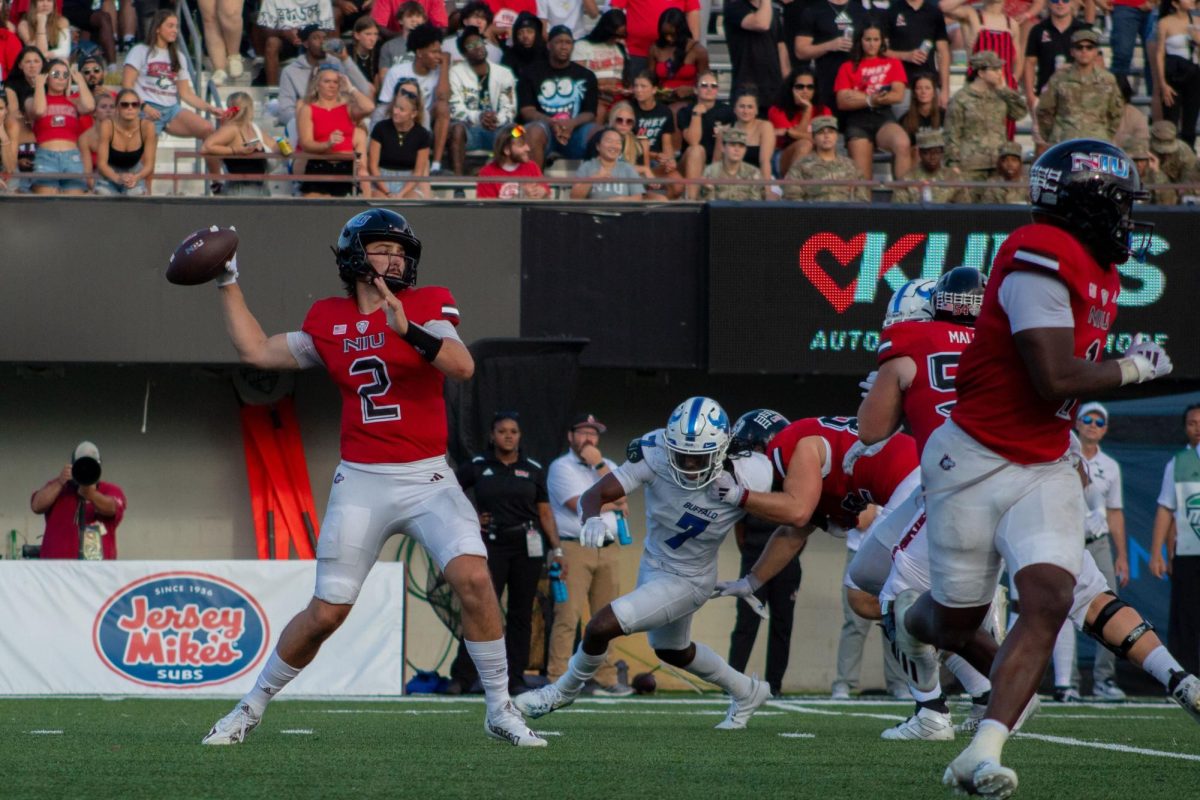 NIU redshirt junior quarterback Ethan Hampton (2) attempts a pass during Saturday’s overtime loss to the University at Buffalo at Huskie Stadium in DeKalb. Hampton finished 23-of-43 passing for 194 yards and an interception. (Totus Tuus Keely | Northern Star)