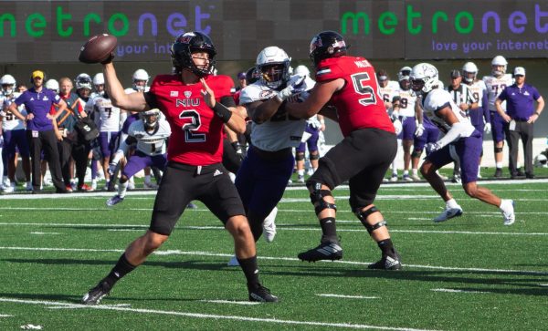 Redshirt junior quarterback Ethan Hampton (2) makes a pass during NIU's 54-15 victory over Western Illinois University on Saturday. Hampton was named the Mid-American Conference Football Offensive Player of the Week for the first time in his career on Monday after throwing for 328 yards and five touchdowns in his first start since Oct. 8, 2022. (Totus Tuus Keely | Northern Star)