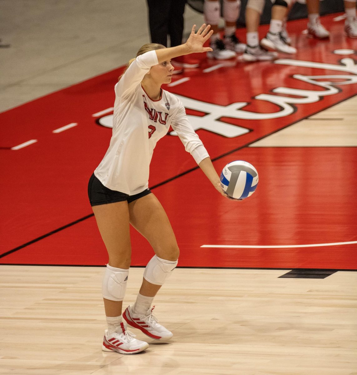 Freshman outside hitter Ava Grevengoed prepares for a serve on Aug. 30 against Western Illinois University. Sports Reporter James Bennett believes Grevengoed and freshman setter Ella Strausberger are key pieces for the future of NIU volleyball. (Tim Dodge | Northern Star)