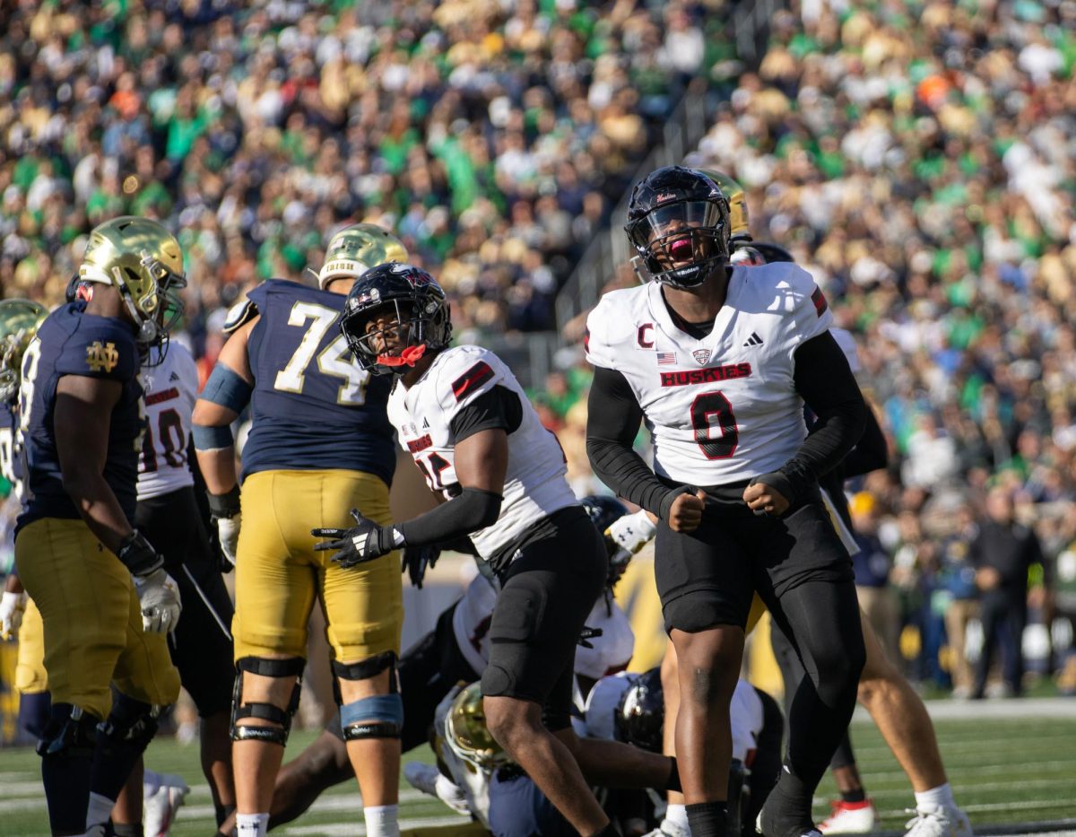 NIU redshirt junior defensive tackle Skyler Gill-Howard (0) celebrates after the NIU defense forced the University of Notre Dame to punt in the third quarter of the Sept. 7 game at Notre Dame Stadium in South Bend, Indiana. NIU held Notre Dame to just 123 rushing yards and intercepted senior quarterback Riley Leonard twice in the game. (Tim Dodge | Northern Star)