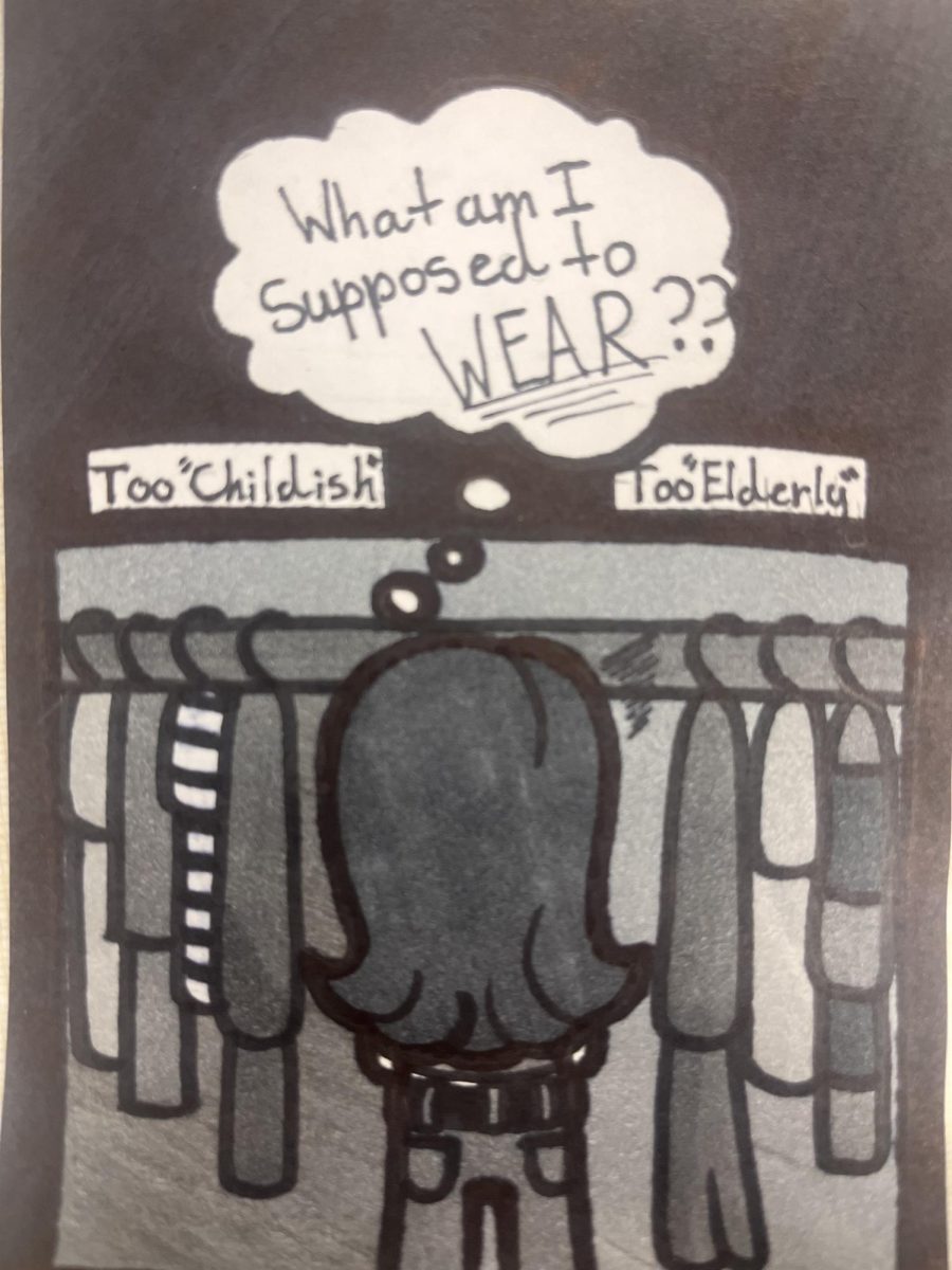 A figure stares at their closet while a thought bubble over their head reads: “What am I supposed to WEAR?” Clothing is often unfairly labeled as too childish or too elderly. (Jayce Weir| Northern Star)