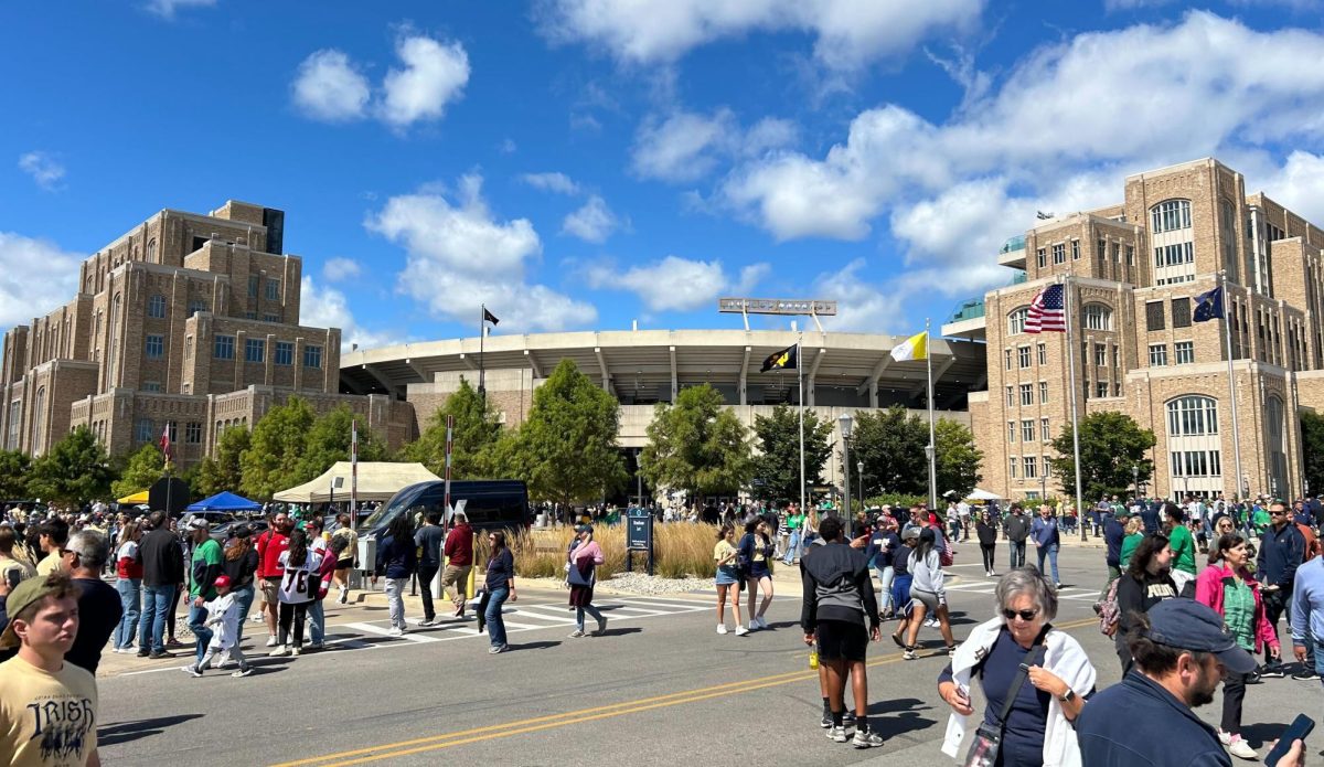 Fans walk around Notre Dame Stadium before kickoff of Saturday’s game between NIU and the University of Notre Dame in South Bend, Indiana. The stadium, considered a “cathedral” of college football, was the site of NIU’s historic upset of the then-fifth-ranked Fighting Irish. (Skyler Kisellus | Northern Star)