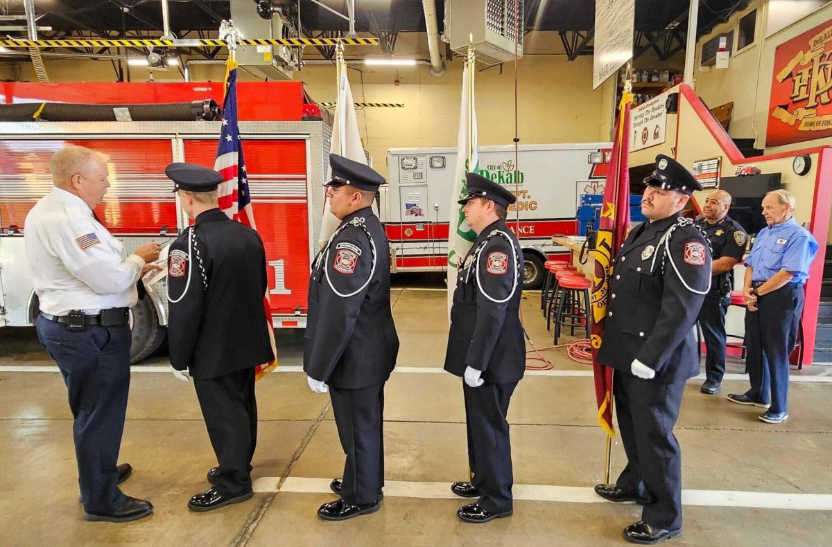 Members of the DeKalb Firefighters Color Guard stand in a line at the 9/11 event hosted on Wednesday. The 9/11 Patriot Day ceremony honored the memories and sacrifices from those who died on 9/11. (Kahlil Kambui | Northern Star)