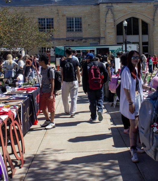 Students browse several fraternities’ and sororities’ tables Sept. 11 at the Involvement Fair. Involvement fairs are a good way to meet members of multicultural fraternities and sororities. (Ethan Rodriguez | Northern Star)