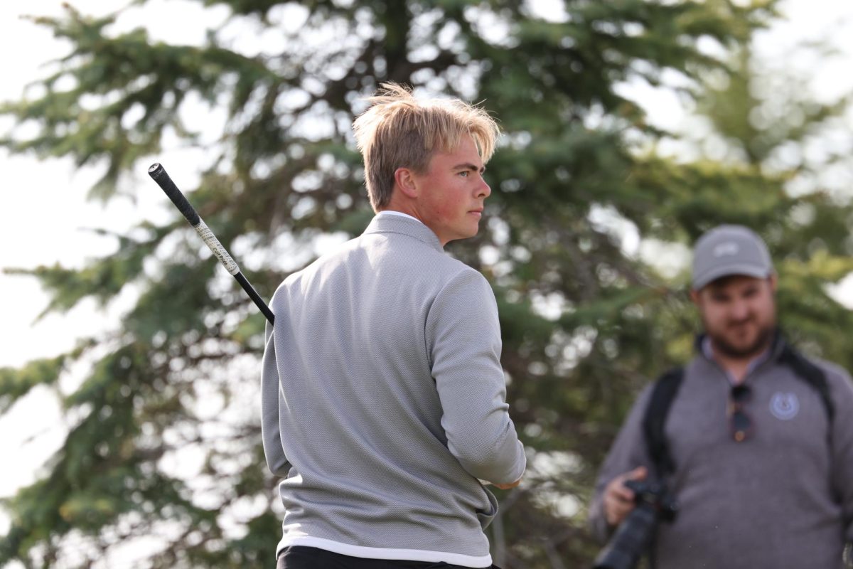 Senior Felix Krammer looks at his shot as he walks back to his bag. NIU men's golf finished in last place Monday at the Island Resort Intercollegiate. (Courtesy of NIU Athletics)