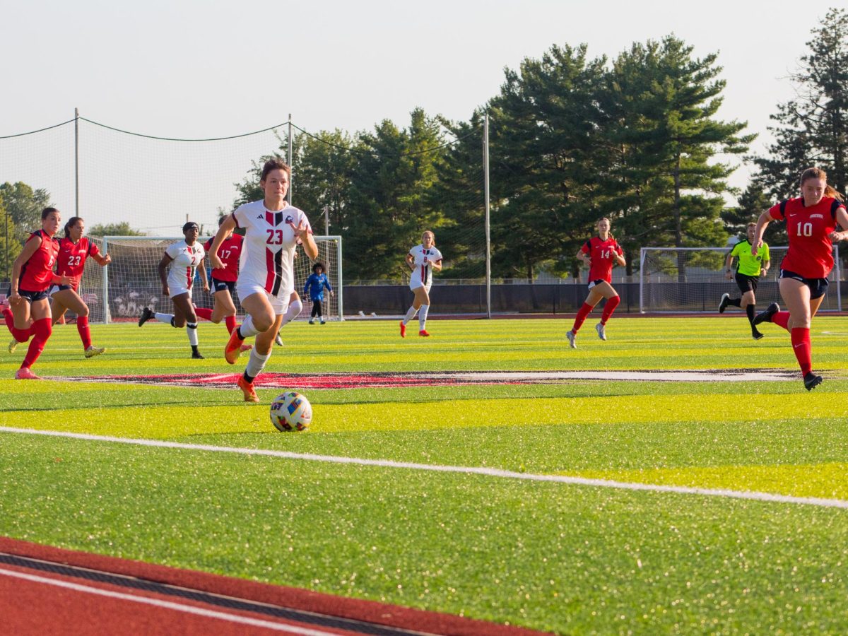 Sophomore forward Kara Machala (23) chases the ball along the sidelines on Aug. 29 against the University of Southern Indiana. NIU women's soccer defeated Illinois State University 1-0 on Thursday, winning its fifth game of the season. (Northern Star File Photo)