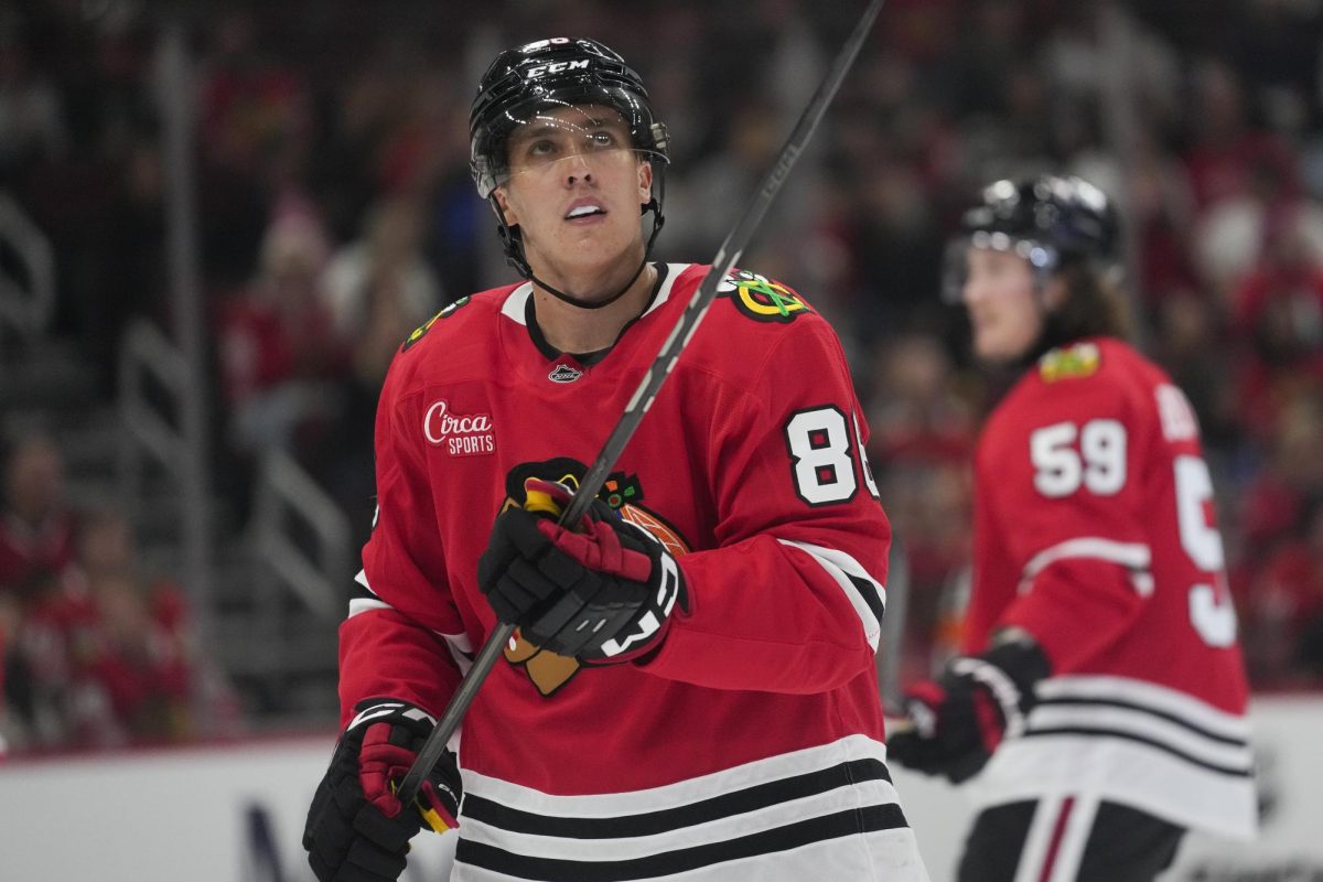 Chicago Blackhawks center Teuvo Teräväinen (86) prepares for the face-off against the Detroit Red Wings during the first period of a preseason game on Sept. 25 in Chicago. Teräväinen signed with the Blackhawks in the 2024 off-season after being traded from Chicago in 2016. (Erin Hooley | AP Photo)