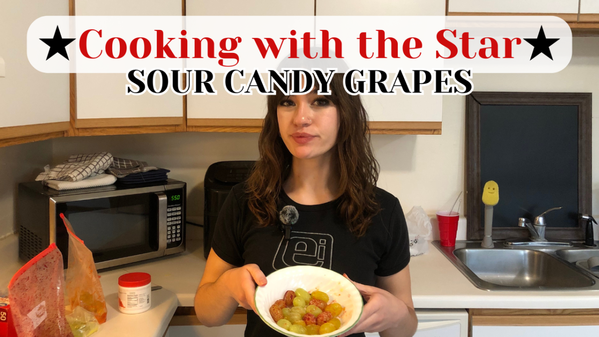 Lifestyle Editor and Social Media Manager Brynn Krug poses with a bowl. On this episode of Cooking with the Star, learn how to make sour candy grapes. (Northern Star Graphic)