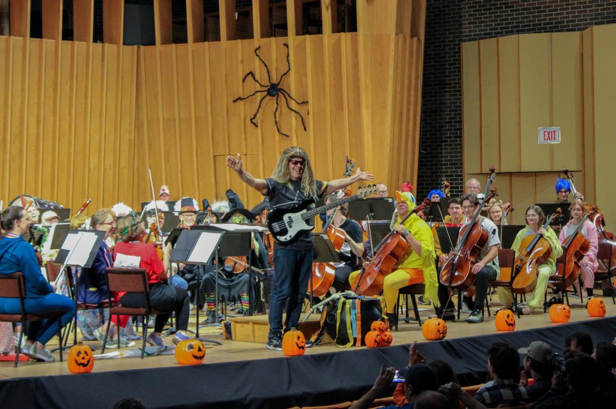 The Kishwaukee Symphony Orchestra performs to the audience to kick off the concert on Wednesday night in the Boutell Concert Hall. The Kishwaukee Symphony Orchestra performed several spooky songs in celebration of Halloween. (Nia Jackson | Northern Star)