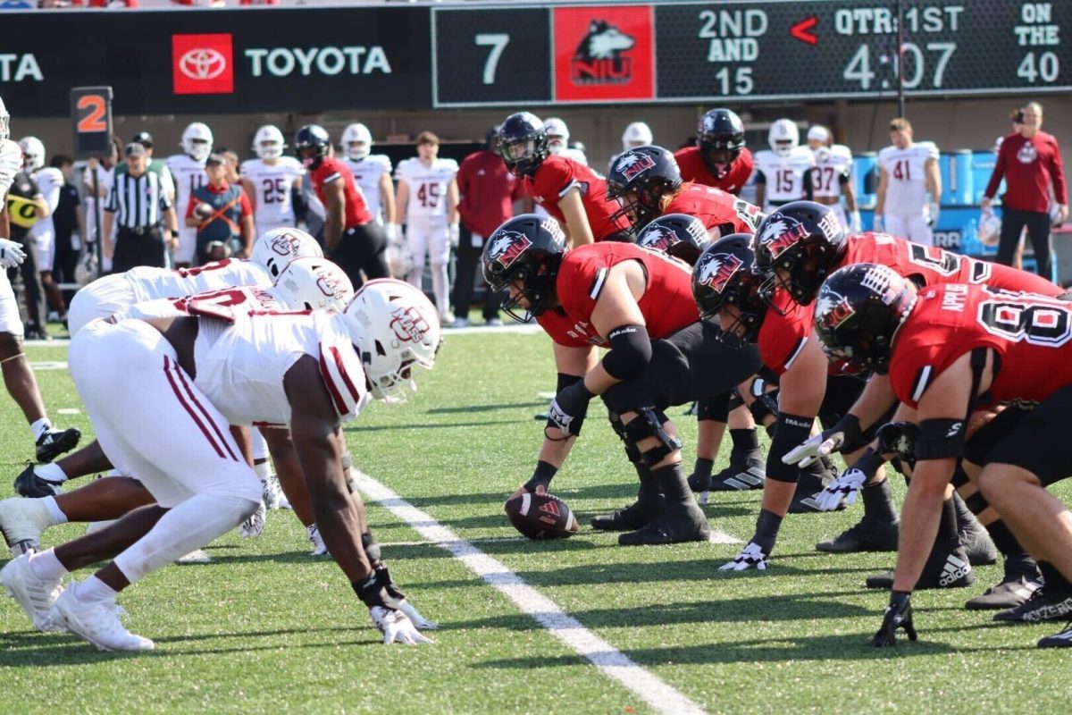 The NIU offense and the University of Massachusetts defense line up at the line of scrimmage during the first quarter of the Huskies’ 34-20 win against the Minutemen on Saturday at Huskie Stadium in DeKalb. NIU’s victory boosted it to a 3-1 non-conference record, its best finish against non-league opponents since 2014. (Marco Alvarez | Northern Star)