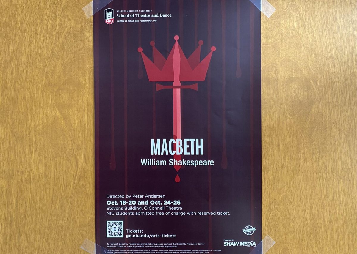 A poster for “Macbeth” hangs in the Stevens Building. NIU’s School of Theatre and Dance brought this Shakespeare play to life at the O’Connell Theatre. (Brynn Krug | Northern Star)