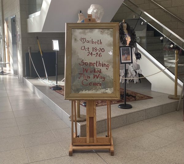 A sign in the Stevens Building advertises the "Macbeth" play. This is NIU School of Theatre and Dance’s second production of the fall 2024 season. (Brynn Krug | Northern Star)