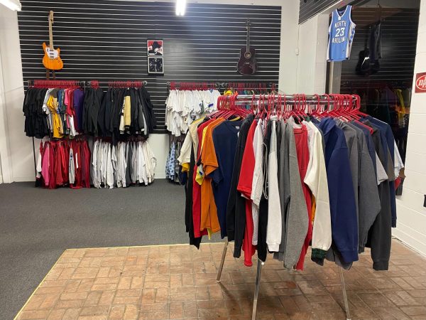 A rack of clothing sits in SommsVintage, located at 866 W. Lincoln Highway. The store has a designated $5 to $10 rack for more affordable clothing. (Brynn Krug | Northern Star)