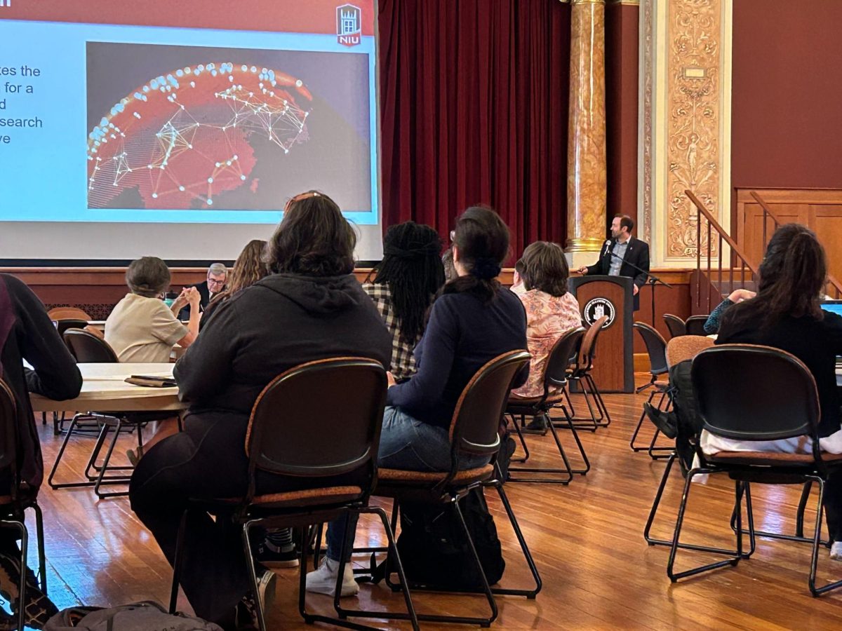 Richard Mocarski, vice president of the Division of Research and Innovation Partnerships, provides an update on RIPS. Faculty Senate met at 3 p.m. on Wednesday in the Altgeld Hall Auditorium. (Emily Beebe | Northern Star)