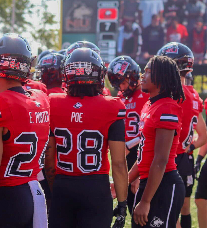  NIU redshirt freshman running back Jaylen Poe (28) walks along the Huskies' sideline during the first quarter of Saturday's 34-20 victory over the University of Massachusetts at Huskie Stadium in DeKalb. Poe rushed for 98 yards and two touchdowns – both career-bests – and returned a kickoff 89 yards in the win. (Marco Alvarez | Northern Star)