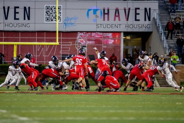 Ball State University sophomore kicker Jackson Courville (96) lines up to kick a game-winning 52-yard field goal to defeat the Huskies 25-23. The Huskies drop to 4-4 on the season and 1-3 in the MAC and have lost their last three meetings with Ball State. (Tim Dodge | Northern Star)