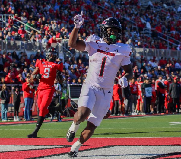  NIU senior running back Antario Brown (1) celebrates after scoring a 34-yard touchdown during the first quarter to tie the game at 7-7. The Huskies will travel to Western Michigan for their next game at 6 p.m. CST Nov. 6 in Kalamazoo, Michigan. (Tim Dodge | Northern Star) 