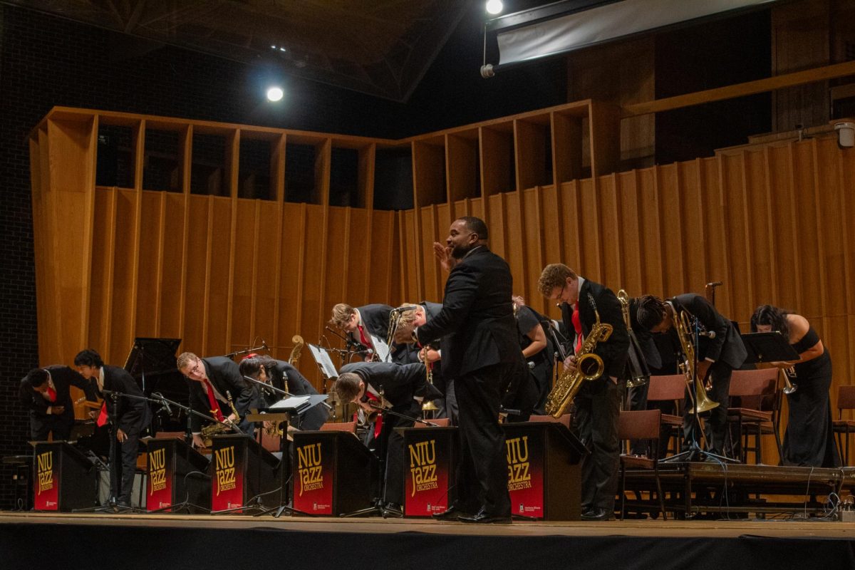 The NIU Jazz Orchestra bows to the crowd after their last song, “Ms. Garvey, Ms. Garvey” composed by Jason Marshall. The NIU Jazz Orchestra is led by Director and Professor of Jazz Studies Roosevelt Griffin III. (Totus Tuus Keely | Northern Star)