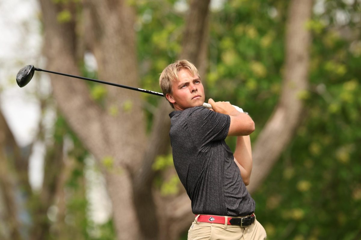 Senior Felix Krammer watches his drive on his follow-through. Krammer finished tied for second place as NIU men's golf captured first place at the Badger Invitational on Tuesday in Madison, Wisconsin. (Courtesy of NIU Athletics)