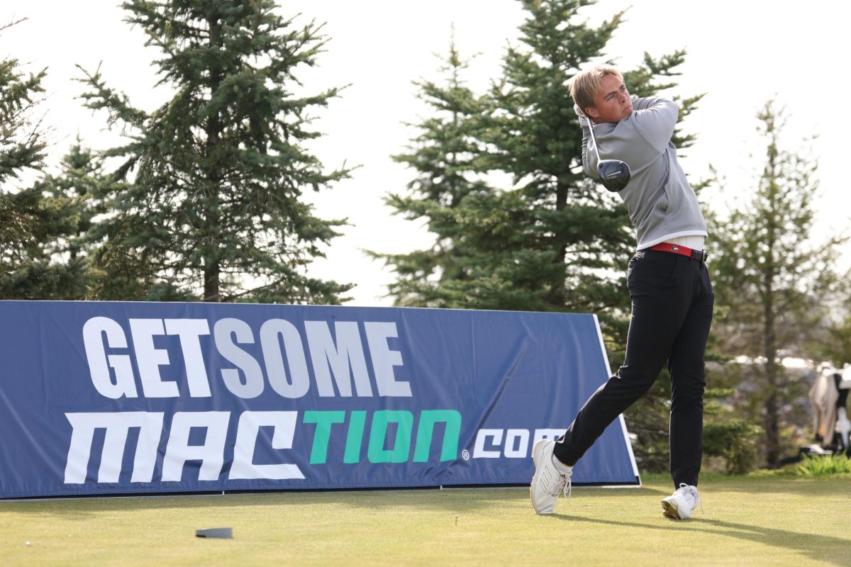 NIU senior golfer Felix Krammer eyes the fairway after completing his drive. Tying for second place, Krammer led the Huskies to Victory this weekend at the Badger Invitational at University Ridge Golf Course in Madison, Wisconsin. (Courtesy of NIU Athletics)