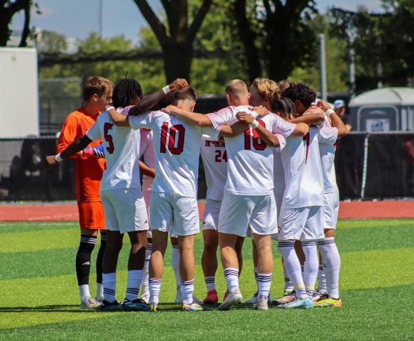 The NIU men's soccer team forms a huddle during its match against the University of Wisconsin-Green Bay Phoenix on Sept. 1. The Huskies fell to Missouri State University by a score of 7-0 on Sunday. (Northern Star File Photo)