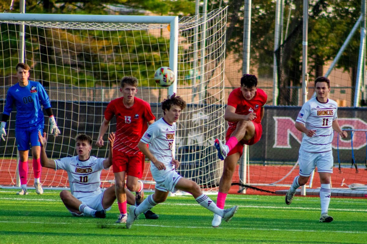 Sophomore defender Luka Vasic (4) clears the ball from the net. NIU lost 1-2 against #14 Western Michigan on Saturday, making them 2-10 overall and 0-4 in the Missouri Valley Conference. (Totus Tuus Keely | Northern Star)