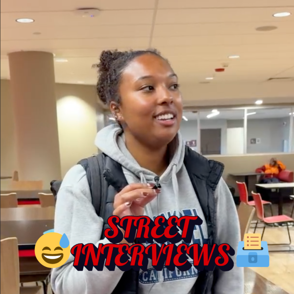 Olivia King, a junior marketing major, responds to a street interviews prompt. In three words, how are you feeling about the presidential election next week? (Northern Star Graphic)