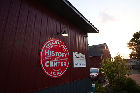 A red sign hangs on the DeKalb Country History Center, located at 1730 N. Main St. in Sycamore. The center will host the "Eat Your Words" poetry event at 6:30 p.m. Thursday. (Northern Star File Photo)