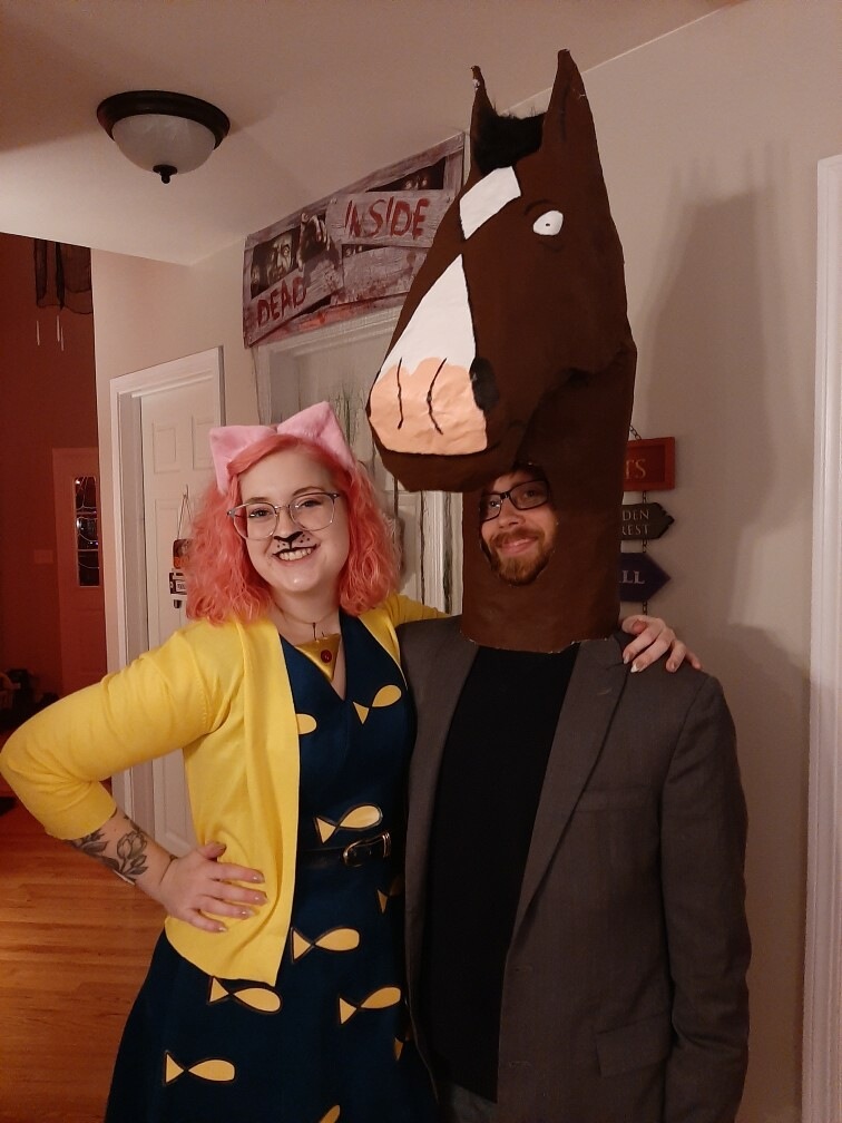 Nick Cipra, a senior geology major, poses in a large paper mache horse head as BoJack Horseman for the Northern Star Halloween Costume Contest. Cipra's first time using paper mache was for the creation of this costume! (Courtesy of Nick Cipra)