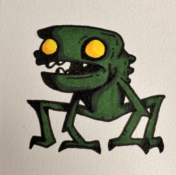 Grimm the Goblin, a green creature with yellow eyes and a spiny back, crouches on clawed feet. Grimm waits patiently for his chance to terrorize on Halloween next week. (Aidan Renteria | Northern Star)