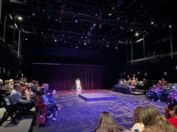 A prop throne sits in the middle of a stage. NIU's School of Theatre and Dance's current play, "Mary Stuart," featured no physical set besides the throne, instead relying on lighting to create the set. (Tyler Gordon | Northern Star)