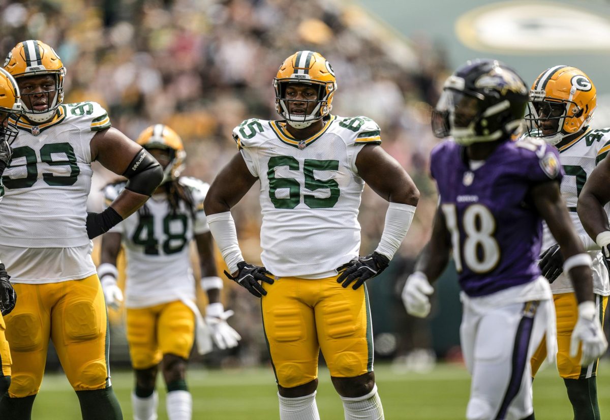 Green Bay Packers defensive lineman James Ester (65) stands at the line of scrimmage during the Packers’ preseason game against the Baltimore Ravens on Aug. 24 at Lambeau Field in Green Bay, Wisconsin. Ester is midway through his rookie season in the NFL after being signed by the Packers as a undrafted free agent in April. (Evan Siegle | Green Bay Packers)