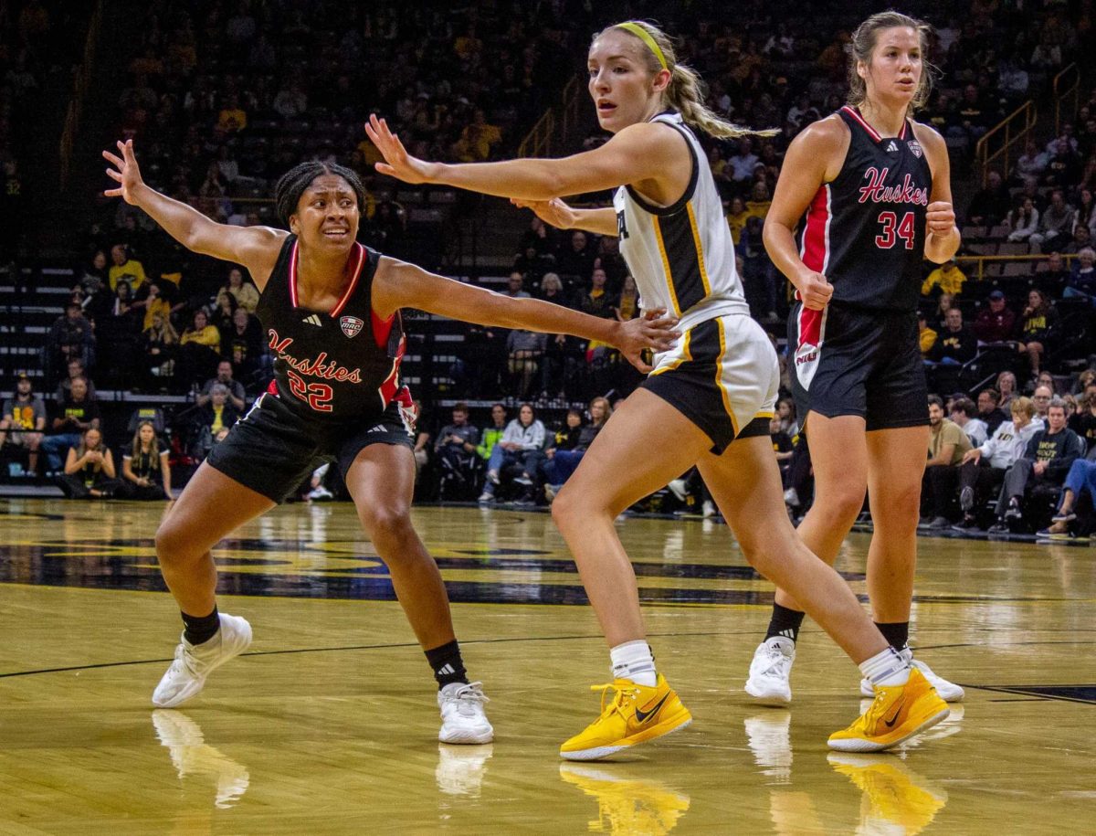 Junior guard Alecia Doyle (22) tries to gain separation while graduate student forward Brooke Stonebraker (34) stands open on Nov. 6 at Carver-Hawkeye Arena. Doyle and Stonebraker each scored 17 points in a 67-60 win over the University of Wisconsin-Milwaukee on Sunday. (Joseph Segreti | Northern Star)