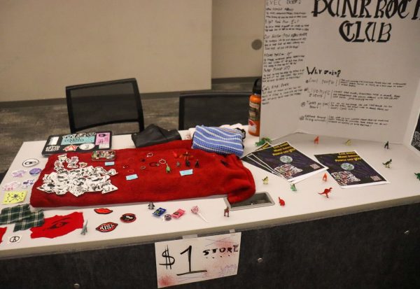 A table of the Punk Rock Club sits at the Oasis area on Thursday during the Discover Your Pack event hosted by the Student Government Association. The Discover Your Pack event promotes organizations recently approved from SGA to try and get students involved in their organizations. (Marco Alvarez | Northern Star)