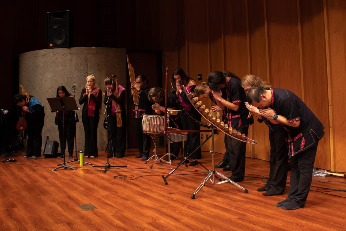 The Thai Music Ensemble bows at the conclusion of its performance at 6:15 p.m. Tuesday. The ensemble is led by Ajarn Chamni Sriparam and meets from 4 p.m. to 6 p.m. Tuesdays and is open to the public. (Totus Tuus Keely | Northern Star)