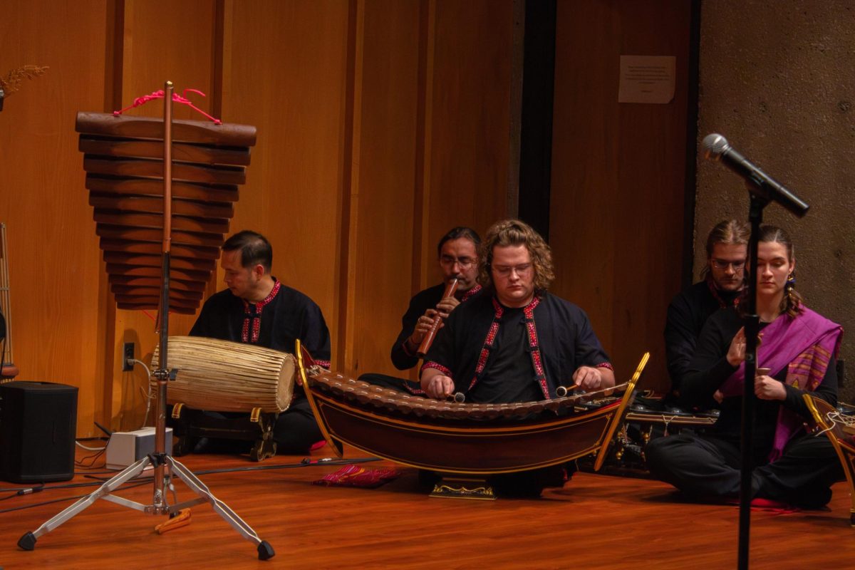 Ajarn Chamni Sriparam joins the Piphat Ensemble during the Thai Music Ensemble Concert Tuesday. Their song “Hao” featured the Pi Nai which sounds most similar to a duck quack. (Totus Tuus Keely | Northern Star)