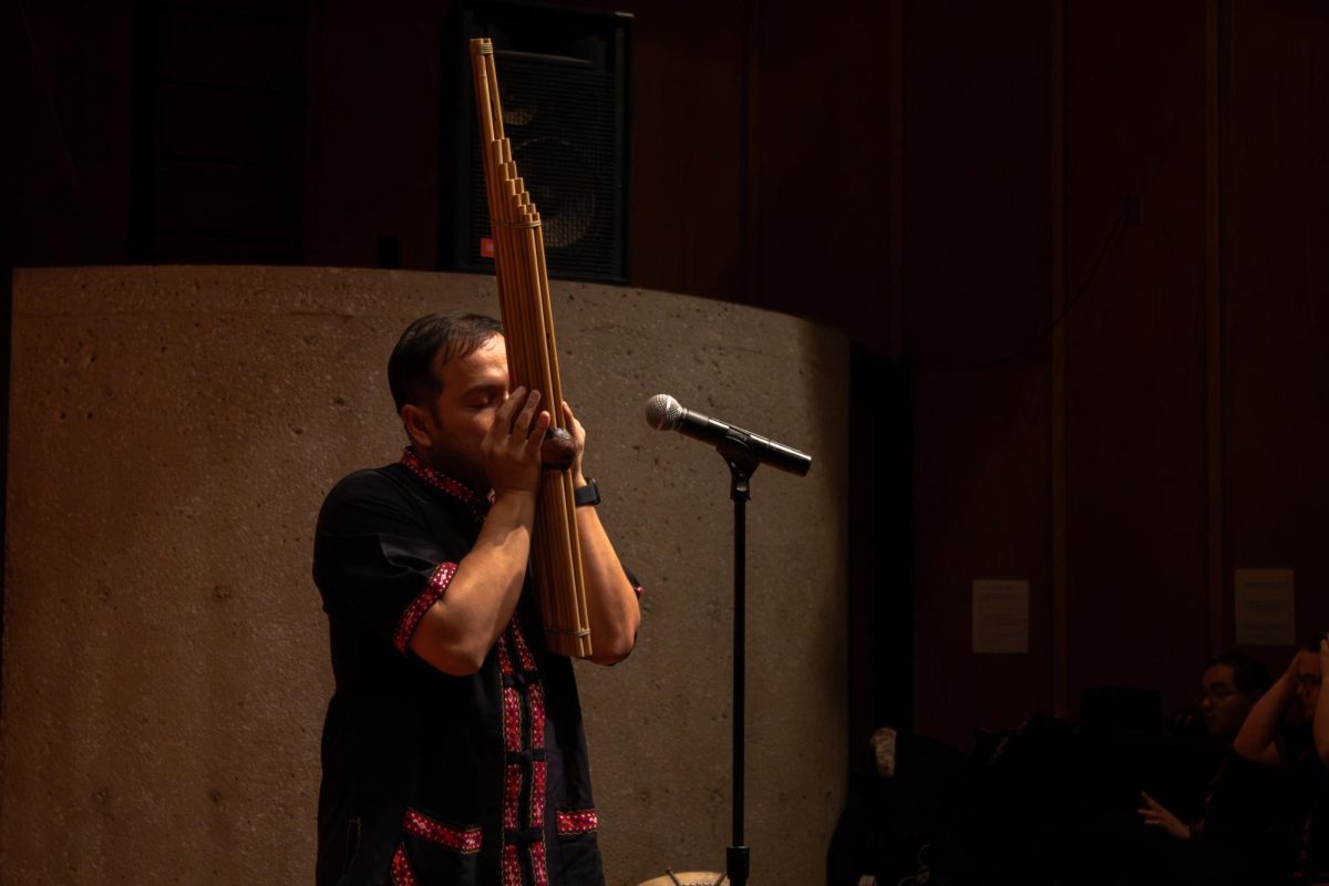 Ajarn Chamni Sriparam, director of the Thai Music Ensemble, opens the performance with a solo performance on the Khaen. Chamni Sriparam is “known as the King Khaen or Kaen Man” according to John Hartmann. (Totus Tuus Keely | Northern Star)