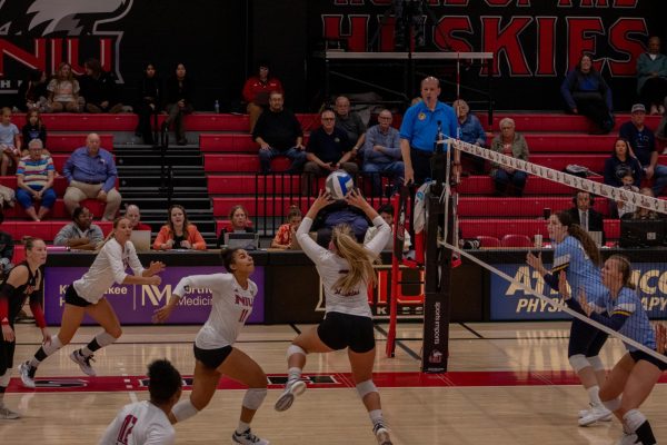 Freshman setter Ella Strausberger sets the ball to her teammates on Oct. 10 at Victor E. Court. NIU women's volleyball lost in three sets to the University at Buffalo Bulls on Friday. (Northern Star File Photo)