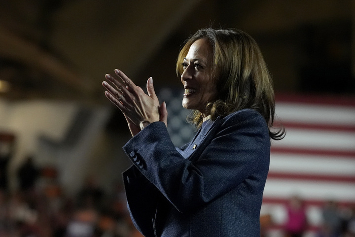 Democratic presidential nominee Vice President Kamala Harris claps her hands and smiles while speaking Sunday at a rally on the Michigan State University Campus. Opinion Columnist Sofia Didenko hopes voters will remember Donald Trump’s attacks on Harris’ initiative are clearly misplaced with a better understanding of the vice president’s role in the White House. (AP Photo/Jacquelyn Martin)