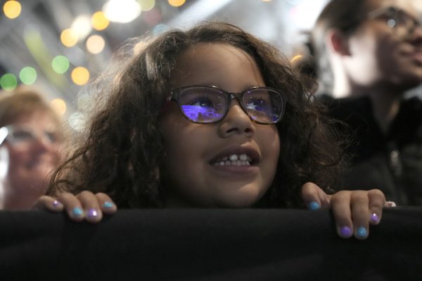 A young child watches as Democratic presidential nominee and Vice President Kamala Harris speaks Monday at a campaign event in Scranton, Pennsylvania. Opinion Editor Lucy Atkinson pleads for voters to think of America’s future generations and cast a vote for Harris this election. (AP Photo/Jacquelyn Martin)