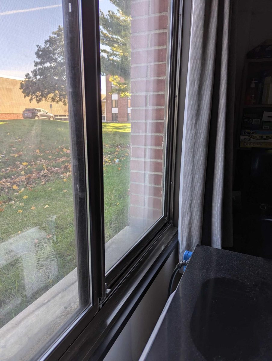 Opinion Columnist Ethan Ernst’s Neptune West residence hall window is firmly shut on a chilly autumn day. Ernst encourages all students in residence halls to remain cognizant of the impact seemingly small decisions can have, like leaving dorm windows open during cold weather. (Ethan Ernst | Northern Star)