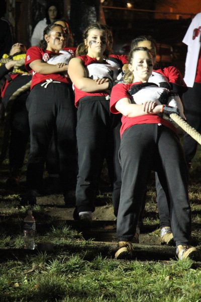 Alpha Sigma Alpha's tug team stands in a hang on Nov. 8, 2023. Alpha Sigma Alpha will face off against Alpha Phi on Wednesday as the NIU Panhellenic Council hosts the first day of women's tugs for 2024. (Northern Star File Photo)