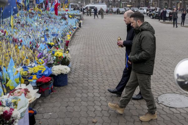 Ukraine’s President Volodymyr Zelenskyy and German Chancellor Olaf Scholz attend a ceremony of honoring fallen soldiers in Kyiv, Ukraine, Monday. Brian Paul Kaess calls on NIU not to forget Ukraine in an Express Yourself opinion piece. (AP Photo/Evgeniy Maloletka)