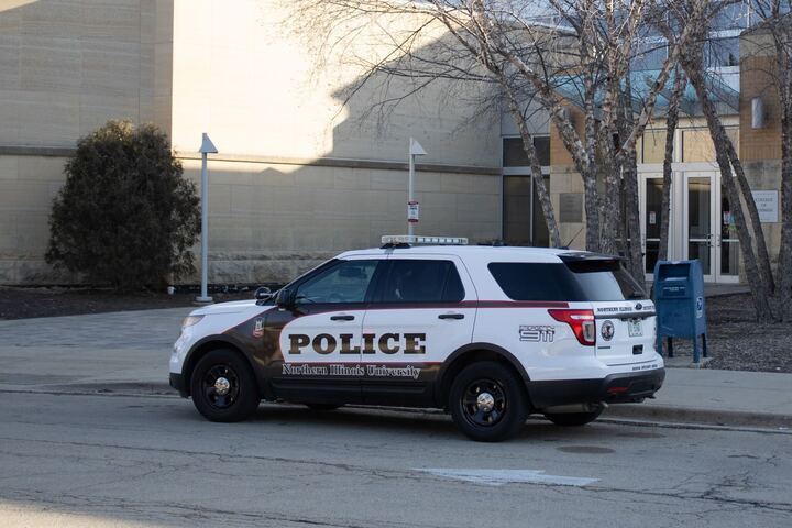 An NIU Police car sits parked on Feb. 26 in front of Barsema Hall. Crimes such as battery and theft under $500 were reported in December 2024 on NIU’s campus. (Northern Star File Photo)