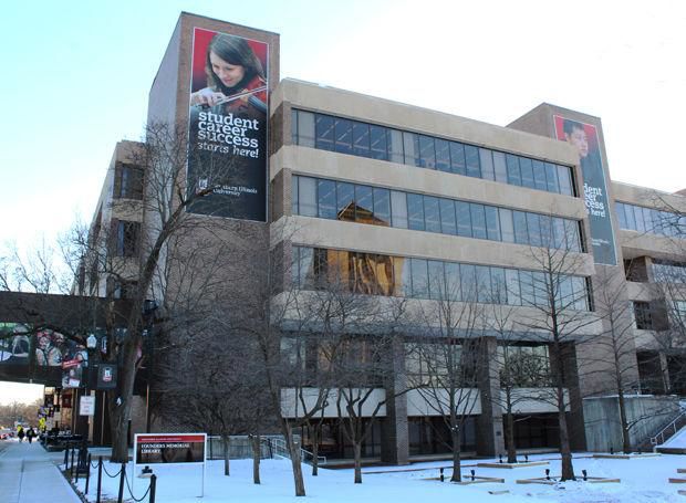 The Founders Memorial Library sits on a snowy day. Nathan Lee expresses his opinion that the Founders Memorial Library hours should be extended on the weekends in order to potentially reduce crime in DeKalb. (Northern Star File Photo)