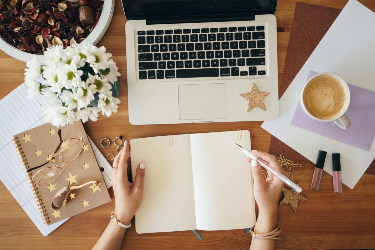 A student sits in front of their desk preparing to start their work. These are a few tips students can use to prepare for the next semester. (GettyImages under Fair Use)